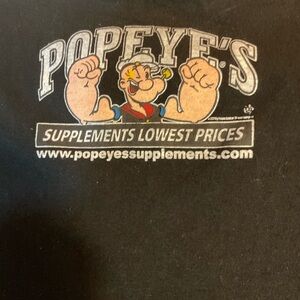 Popeye's Gear Black T-Shirt with Popsicle Design 
Medium men’s 
Good fun shirt